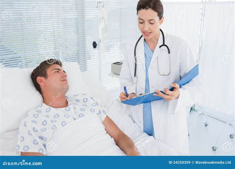 kinky doctor is taking care of the busty brunette hottie|After taking care of his patients the doctor fucks the busty.
